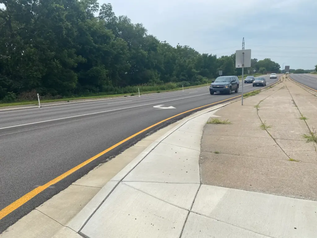 image of car in left turn lane on Hwy 55